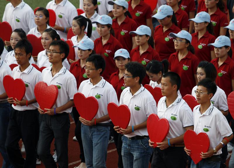 Foxconn si-a scos angajatii la un mars pentru a le creste moralul, Foto: Reuters