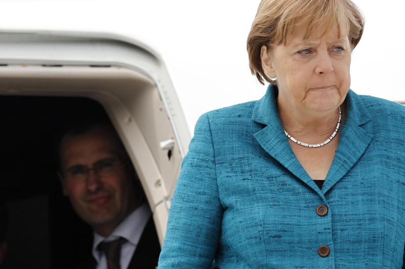 Angela Merkel, tinuta-n aer de Iran, Foto: Reuters
