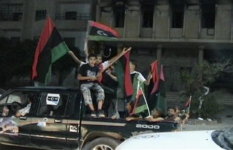 Libieni din Misrata celebrind intrarea rebelilor in Tripoli, Foto: Reuters