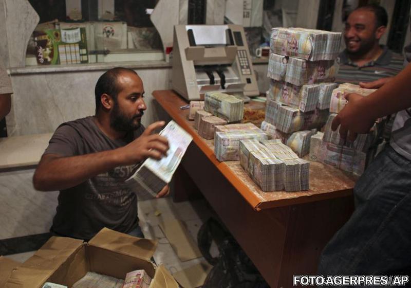 A inceput vanatoarea dupa banii lui Gaddafi, Foto: Agerpres/AP