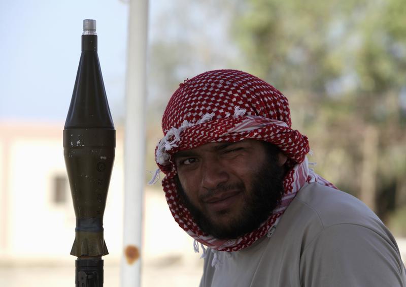 Rebel libian cu un aruncator de grenade, Foto: Reuters