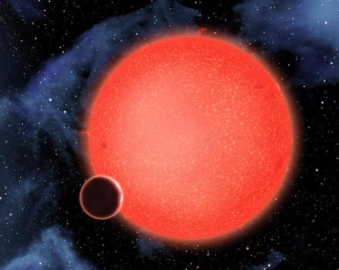Exoplaneta GJ 1214b in jurul stelei sale, Foto: NASA