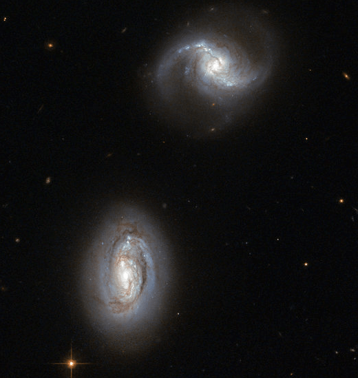 Galaxiile gemene din constelatia Triangulum, Foto: ESA/Hubble & NASA/Judy Schmidt