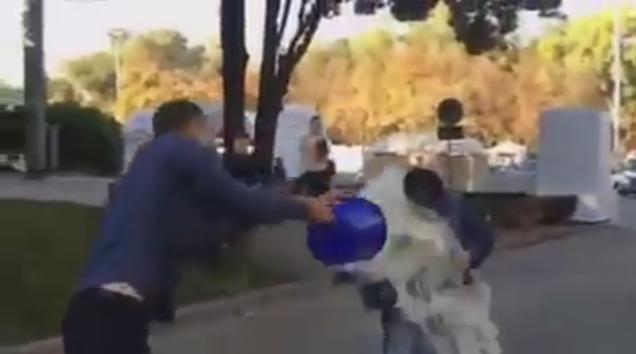 Ministrul Finantelor din Moldova, stropit cu lapte, Foto: Captura YouTube