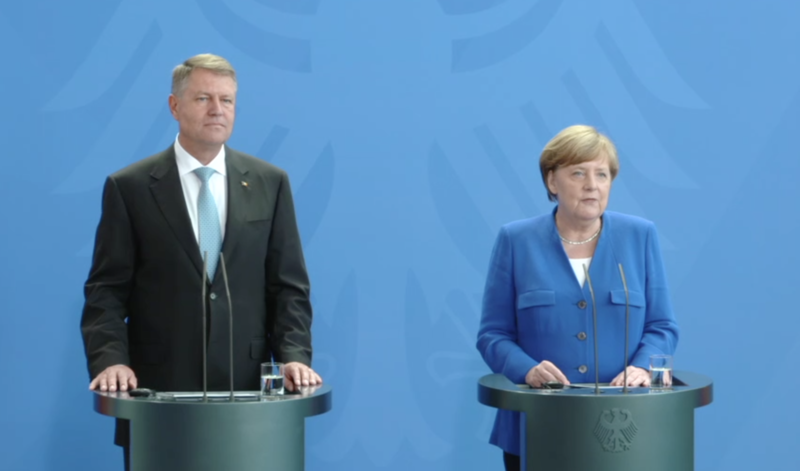 Klaus Iohannis si Angela Merkel, Foto: Captura Privesc.eu