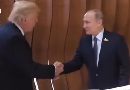 Donald Trump si Vladimir Putin, prima strangere de mana, Foto: Captura YouTube