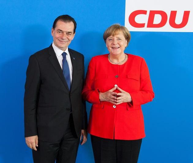 Ludovic Orban si Angela Merkel , Foto: Facebook - Partidul National Liberal