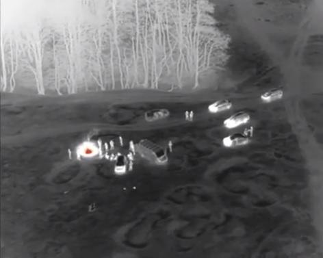 Prinsi la gratar cu ajutorul dronei, in Patrauti, localitate suceveana aflata in carantină, Foto: Captura