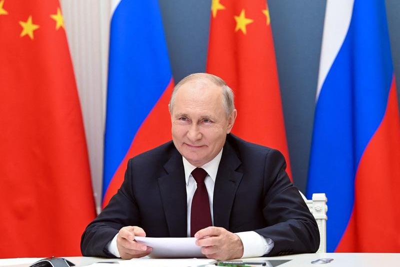 Vladimir Putin, in videoconferinta cu Xi Jinping, Foto: Alexey NIKOLSKY / AFP / Profimedia