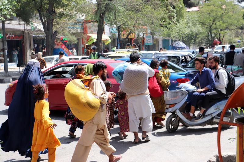 Oameni fugind din Kabul inainte de sosirea talibanilor, Foto: Profimedia Images / AFP