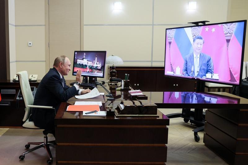 Discutie intre Vladimir Putin si Xi Jinping, Foto: Mikhail Metzel / TASS / Profimedia Images