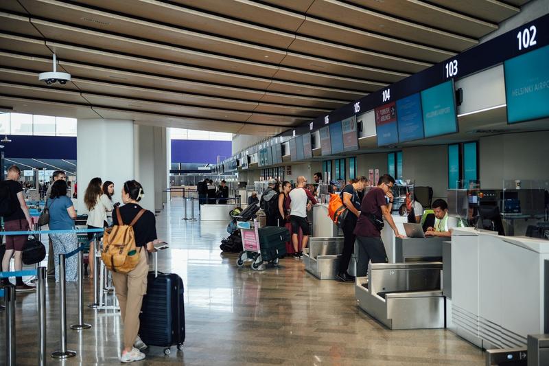 Cetateni rusi pe aeroportul din Helsinki, Foto: Alessandro RAMPAZZO / AFP / Profimedia