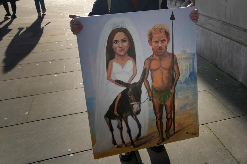 Printul Harry si Meghan - caricatură, Foto: Kirsty Wigglesworth / AP - The Associated Press / Profimedia