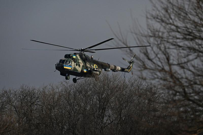 Elicopter Mi-8 zburând la joasă altitudine, Foto: Aris Messinis / AFP / Profimedia Images