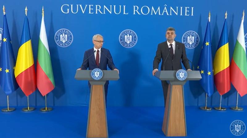 Nikolai Denkov si Marcel Ciolacu, Foto: Captura Guvern