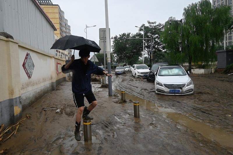 Ploi torențiale fac ravagii în China, Foto: PEDRO PARDO / AFP / Profimedia