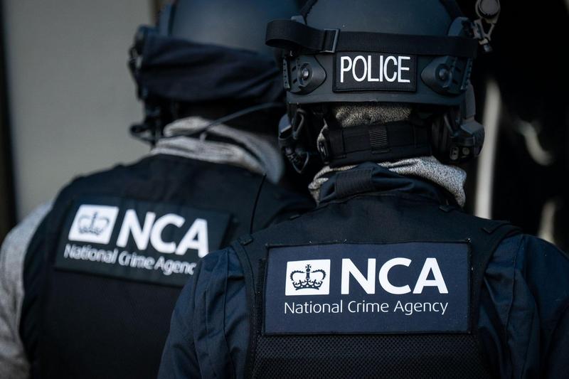Ofițeri ai ​Agenţiei britanice de combatere a criminalităţii organizate NCA, Foto: PA Images / Alamy / Alamy / Profimedia