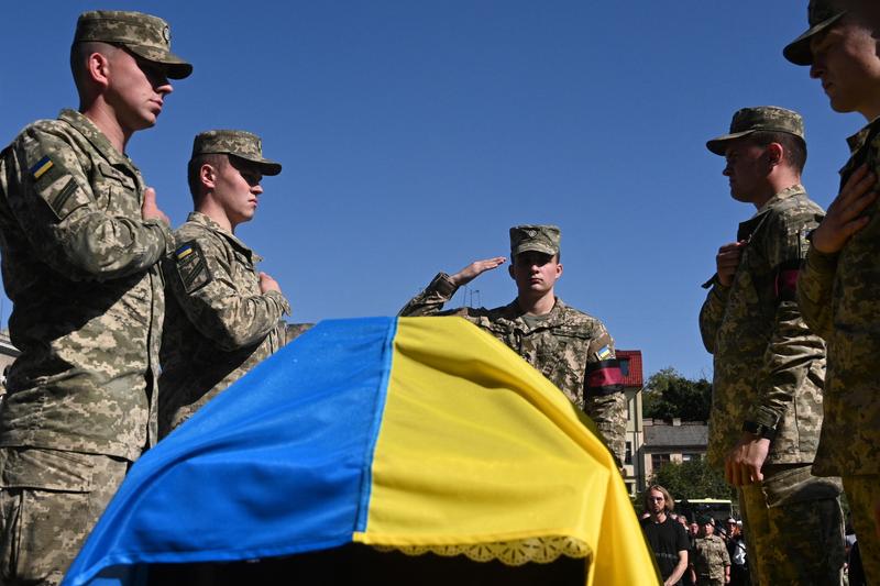 Ceremonie în Liov pentru un soldat ucrainean căzut în războiul cu Rusia, Foto: Yuriy Dyachyshyn / AFP / Profimedia Images