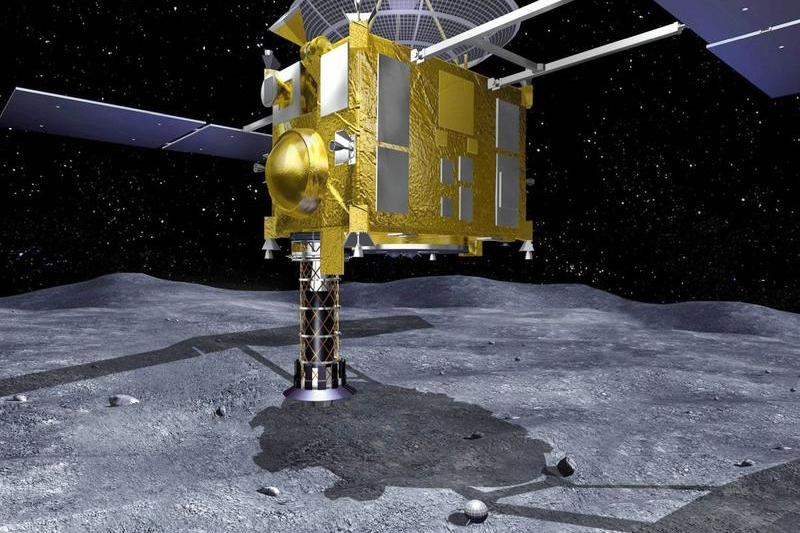 Sonda Hayabusa colecteaza material de pe asteroidul Itokawa, Foto: Japan Aerospace Exploration Agen / AFP