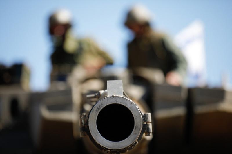 Soldați israelieni pe un tanc Merkava, Foto: Jalaa MAREY / AFP / Profimedia