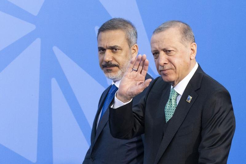 Recep Erdogan alaturi de ministrul sau de externe, Hakan Fidan, Foto: Aytac Unal / AFP / Profimedia Images