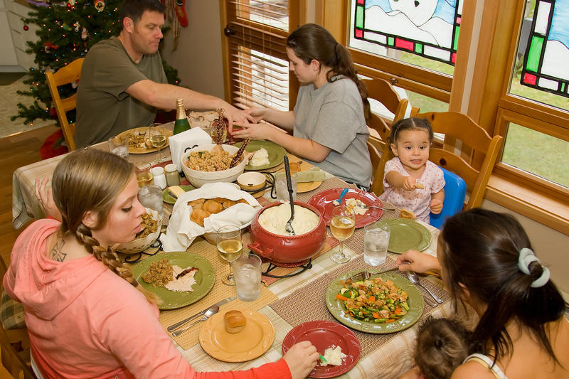 Familie la masă, Foto: © Crystal Craig | Dreamstime.com