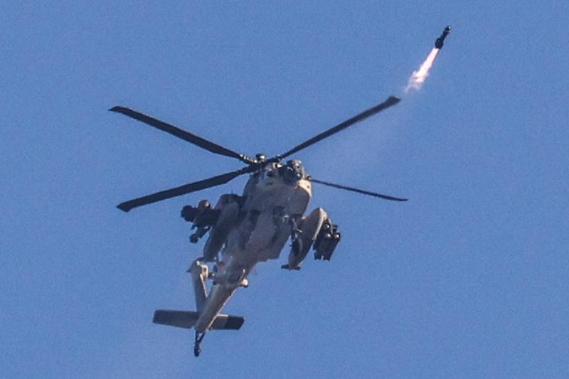 Elicopter israelian trăgând în ținte din Gaza, Foto: JACK GUEZ / AFP / Profimedia