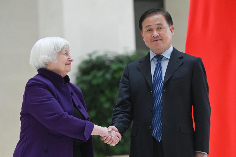 Janet Yellen, secretarul american al Trezoreriei, alaturi de Pan Gongsheng, guvernatorul Bancii Centrale a Chinei, Foto: Pedro Pardo / AFP / Profimedia Images