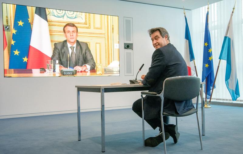 Markus Soder in timpul unei videoconferinte cu Emmanuel Macron, Foto: PETER KNEFFEL / AFP / Profimedia