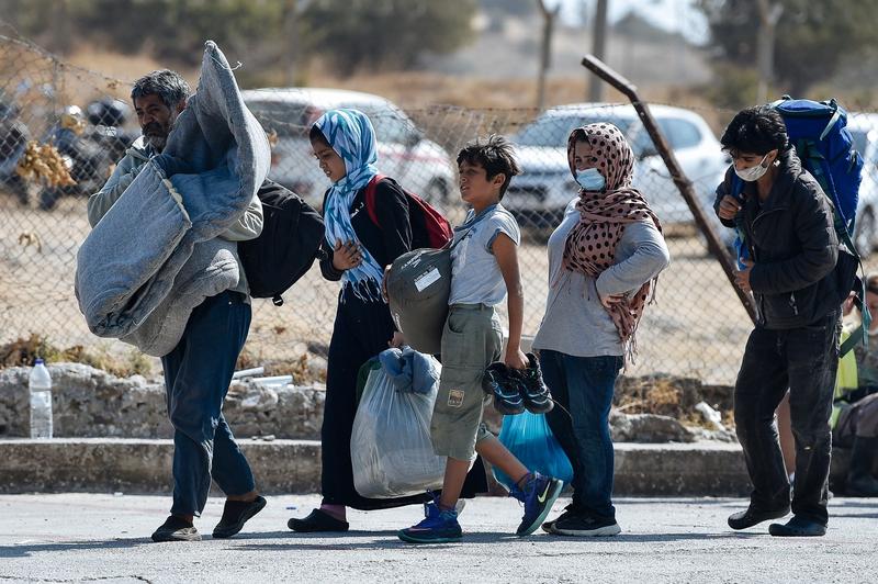 Migranti evacuati din tabara Moria, Lesbos, Foto: LOUISA GOULIAMAKI / AFP / Profimedia