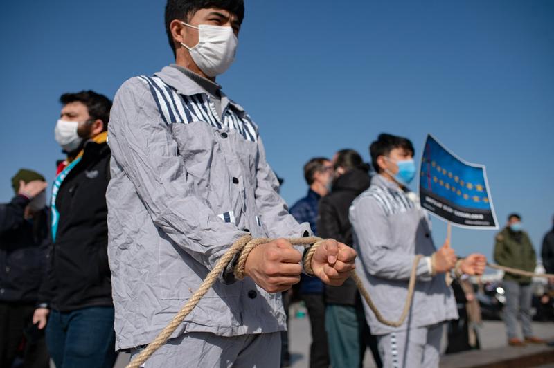 Membri ai comunitatii de uiguri, Foto: Yasin AKGUL / AFP / Profimedia